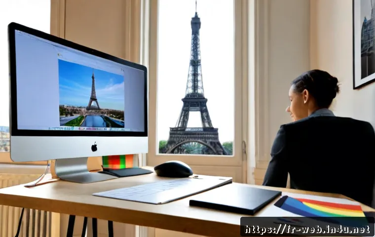웹디자인 UI 요소 디자인 - Photorealistic French web designer working at a clean Paris studio desk, large monitor displaying a ...